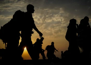 Australia repatriates migrants to remote island amid controversy