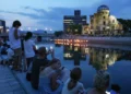 Global tragedies loom over Hiroshima commemorating nuke victims