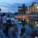 Global tragedies loom over Hiroshima commemorating nuke victims