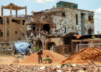 War-weary Sudanese rebuilding capital Khartoum brick by brick