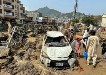 Pakistan floods kill over 300 as rescuers dig for bodies from landslides