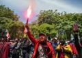 3 dead in Indonesia after angry mob torches regional parliament building